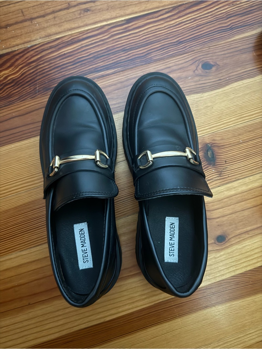 Steve Madden Black Leather Mules with Gold Buckle Detail